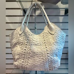 New Designer Direct Lizard print Genuine Leather bag with woven details.